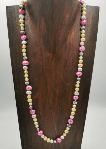 Strand of mixed multi-coloured freshwater pearls, with a toggle clasp.  Total necklace length 60cm.